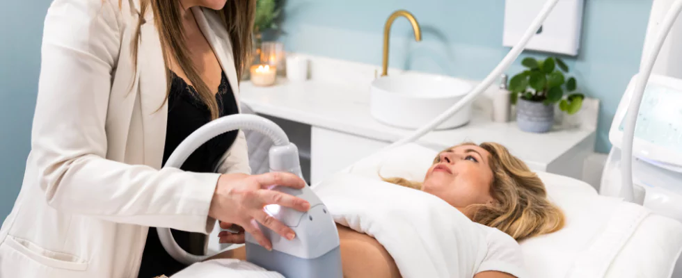 Muscle Definer Treatment on woman's abdomen